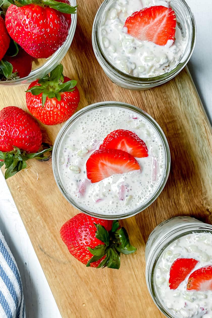 Top view of 3 Strawberry Overnight Oats jars