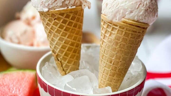 Side view of 2 cones of No Churn Watermelon Ice Cream