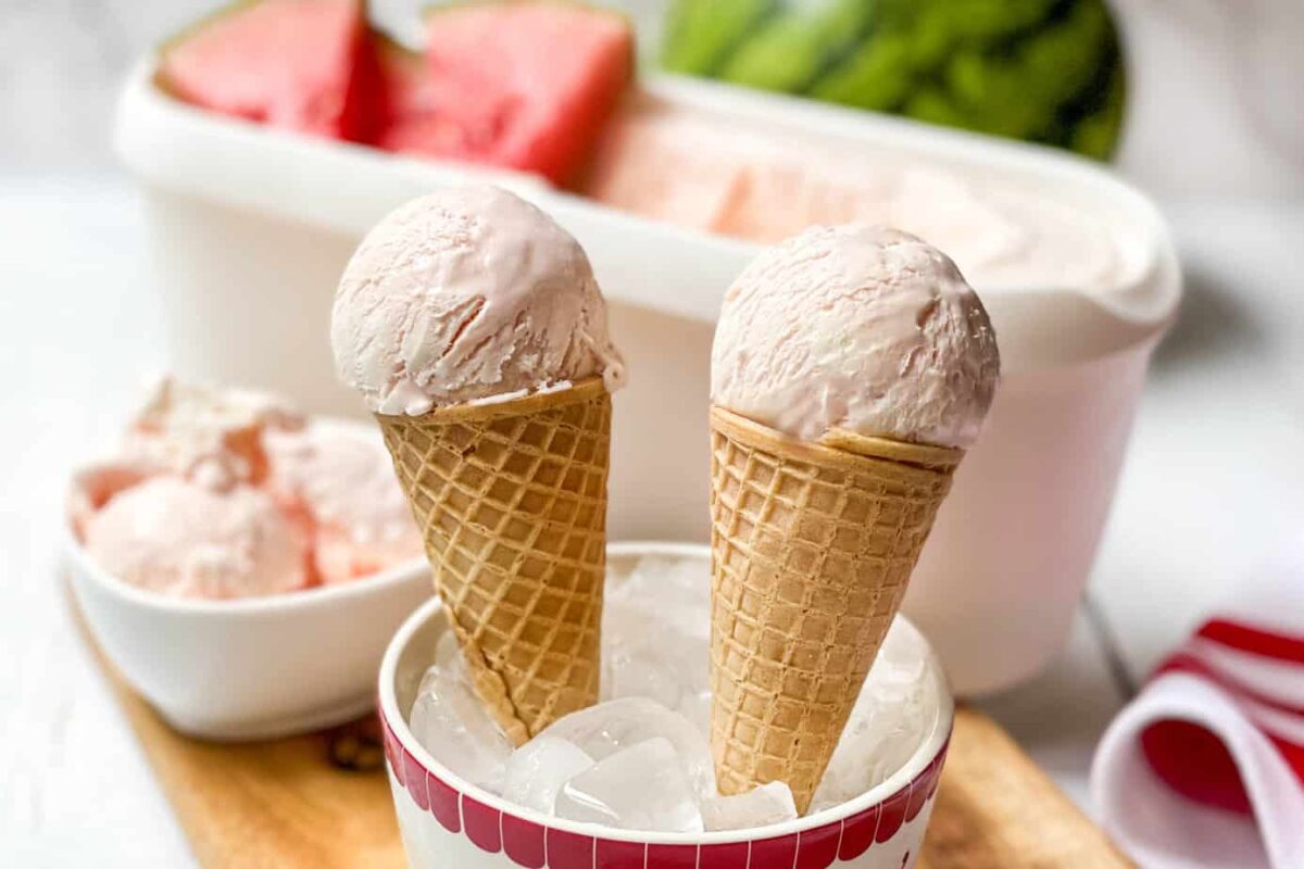 Two sugar cones filled with No Churn Watermelon Ice Cream