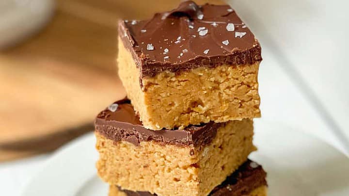 Top side view of 3 stacked salted No Bake Chocolate Peanut Butter Bars with