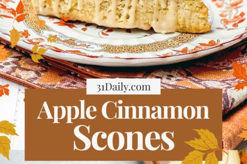 Apple cinnamon scones with maple glaze on vintage plates, styled for fall teatime with apples, tea, and autumn leaves. Easy homemade scone recipe for cozy baking.