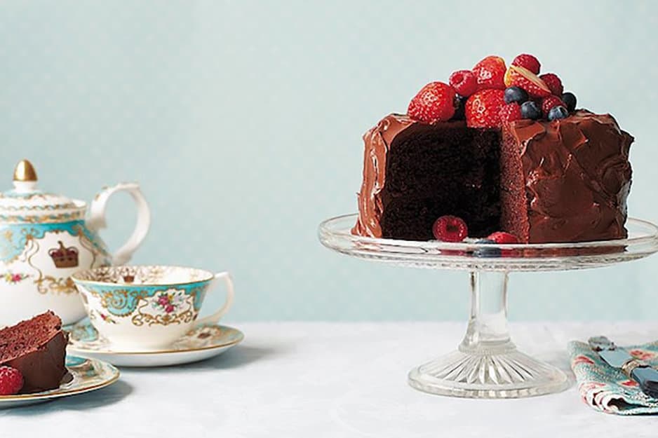 Side view of Bohemian Chocolate Cake on a pedestal with Royal china
