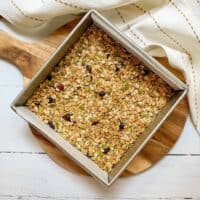 Top view of chilled granola bars in square metal pan