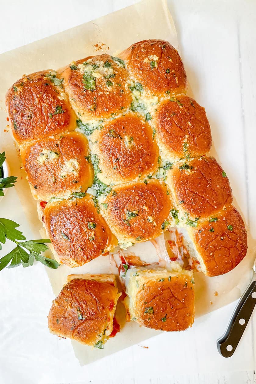 Top view of baked Meatball Hawaiian Roll Sliders pulled apart