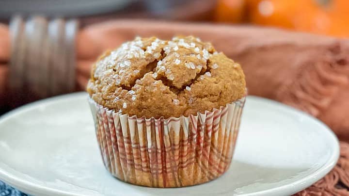 Closeup view of healthy pumpkin muffin on white plate