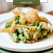 Pinterest Pin image featuring a serving of green bean casserole on a white plate and the words, "Green Bean Casserole, Fresh, Frozen or Canned Beans."
