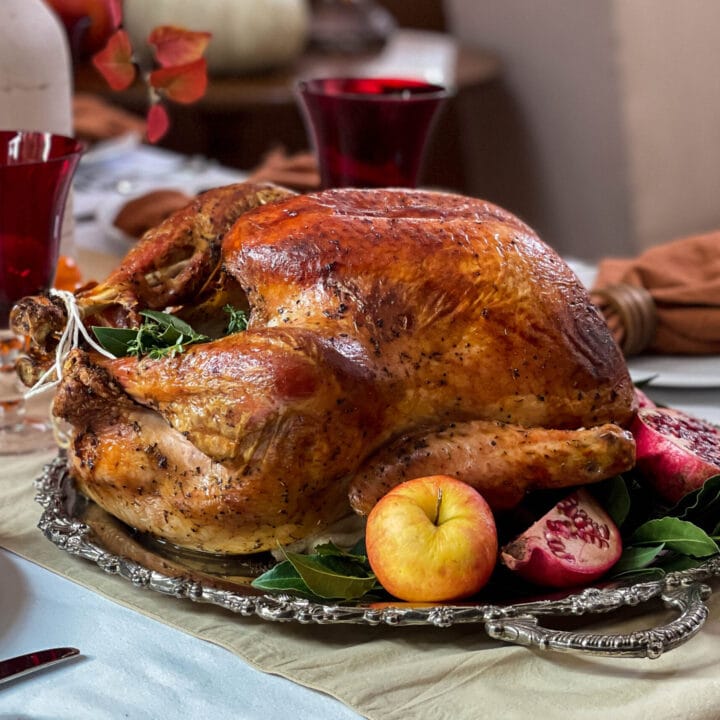 Herb Roasted Turkey at a Thanksgiving Table