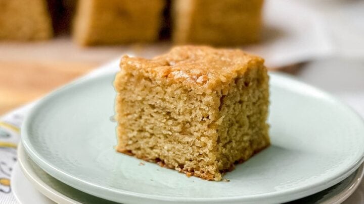 Side view of Maple Banana Snack Cake square serving on a plate