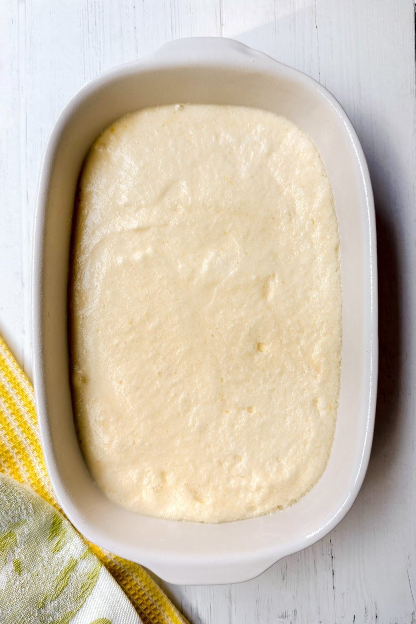 Unbaked Lemon Pudding in an oval baking dish