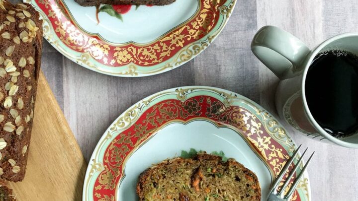 Top view of sliced Healthy Zucchini Bread ready for breakfast service with coffee.