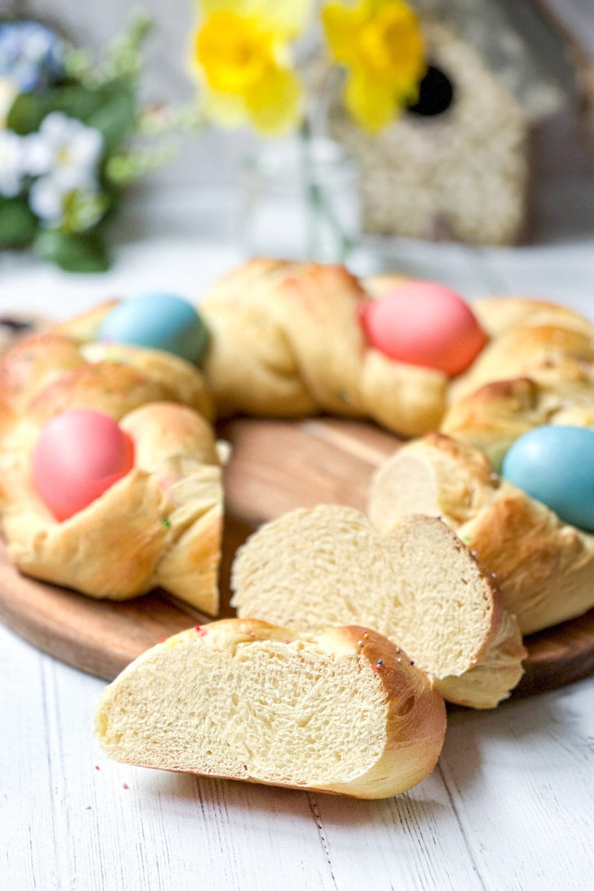 Close up view of sliced Italian Easter Bread with more in the background