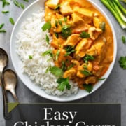 Single image poster of easy chicken curry in a skillet, rich golden sauce with tender chicken, styled with warm tones.