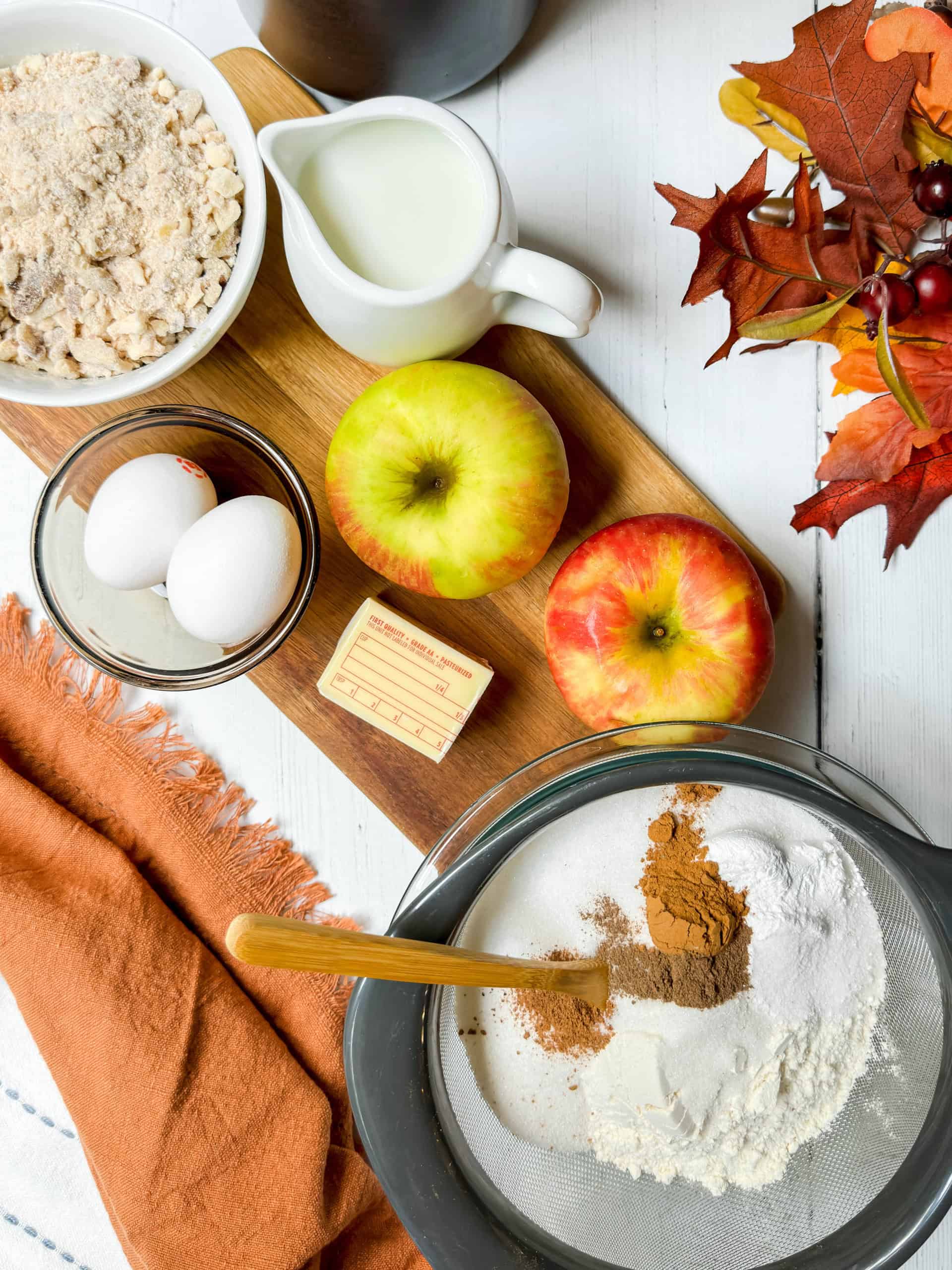 Apple Coffee Cake ingredients including flour, spices, butter, eggs, fresh apples, pecans, and more.