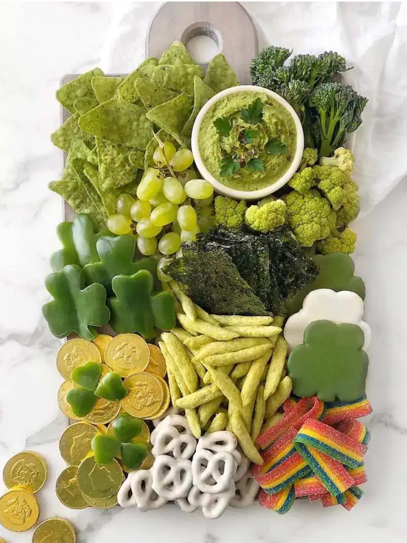St. Patrick's Day snack board for kids with goodies.