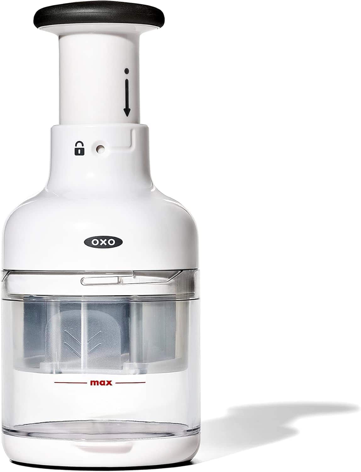 A white and clear OXO branded manual food chopper with a push handle and a visible lock symbol on the front, perfect for prepping ingredients for your favorite salad recipes.