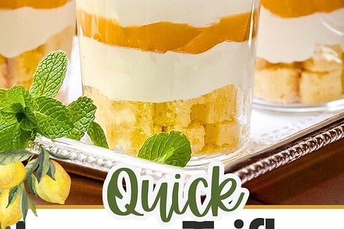 Four glasses of dessert trifles layered with whipped cream, lemon curd, and cake, garnished with mint and lemon slices on a tray. Text reads "Quick Lemon Trifles (No-Bake + Make-Ahead!).