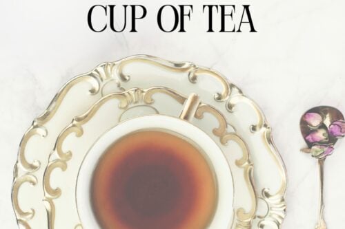 A cup of tea sits on an ornate saucer beside a spoon with floral details, on a marble surface with the text: "Expert Tips: Master the art of brewing tea for a proper cup.