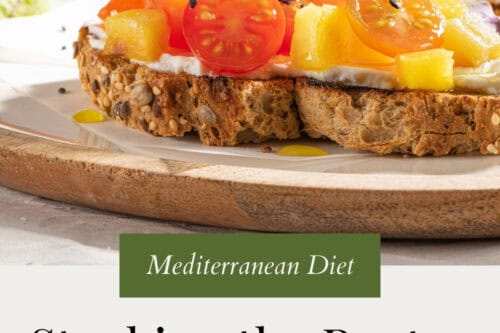 Open-faced sandwiches topped with colorful tomatoes, yellow bell peppers, fresh basil, and greens sit on a plate. Text on the image promotes stocking a Mediterranean diet pantry and offers a free list for healthy meals.