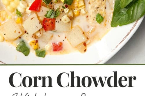 Bowl of corn chowder with bacon, potatoes, corn, red peppers, and herbs, garnished with fresh basil. Below, the corn chowder recipe ingredients—potatoes, corn, broth, cream, bacon, and chopped vegetables—are displayed on a white surface.