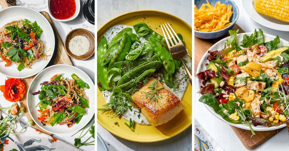 Three colorful plates showcase July 20 Minute Dinners: noodle bowls with veggies and sesame seeds; salmon with snow peas and fresh dill; and a salad with greens, tofu, corn, tomato, and avocado. Small sauce bowls and corn on the cob accompany the meal.