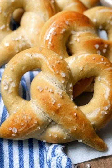 Soft homemade pretzels with mustard sauce for a German treat.