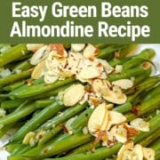 Pinterest Pin image featuring a platter of closeup rows of Green Beans Almondine and the words, "Easy Green Beans Almondine Recipe."