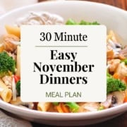 Pinterest Pin image with a bowl of broccoli and sausage pasta and the words, "Easy November Dinners" and "30 Minutes."
