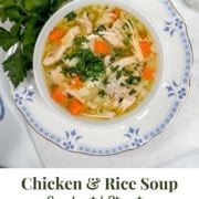 Pinterest Pin image of chicken rice soup ready for serving with fresh herbs on the side.