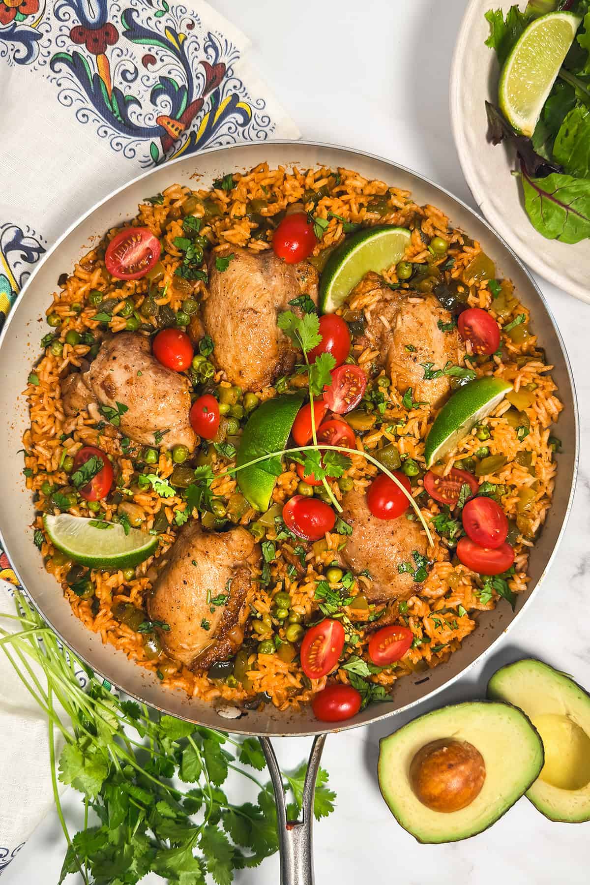 Easy 30 minute arroz con pollo made in one skillet with tender chicken and seasoned rice.