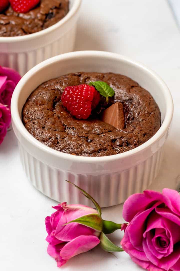 Mini chocolate cake for two with a lava-style chocolate center, served in a ramekin.