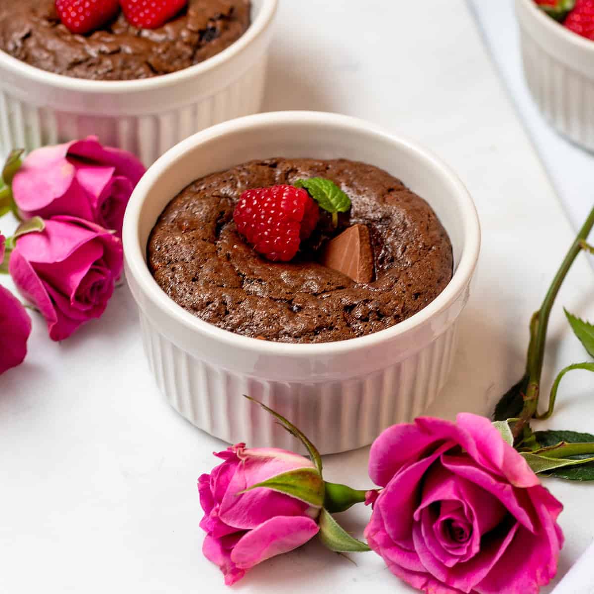 Mini chocolate cake for two with a lava-style chocolate center, served in a ramekin.