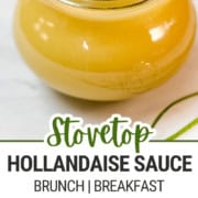 A glass jar filled with creamy Stovetop Hollandaise Sauce sits on a marble surface. Below, small bowls hold egg yolk, lemon juice, and cubed butter. Text reads: "Stovetop Hollandaise Sauce.