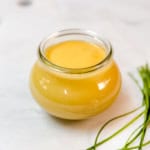 Homemade hollandaise sauce in a jar ready to serve.